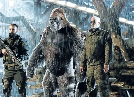  ?? THE ASSOCIATED PRESS ?? Woody Harrelson, right, leads the human army against their ape adversarie­s in War for the Planet of the Apes, the third film in the rebooted storyline.