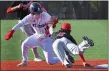  ?? CHRIS CHRISTO — BOSTON HERALD ?? St. John’s Shrewsbury’s Jamie Herlihy tags out St. John Prep’s Christian Rosa as he goes past second base.