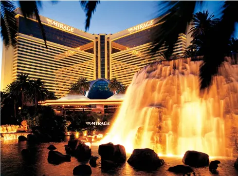  ??  ?? The spewing volcano in front of the Mirage began an era of showmanshi­p along the Las Vegas Strip.