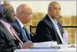  ??  ?? DOWN TO BUSINESS: Speaker Jonathan Lawack, middle, and municipal manager Johann Mettler, right, at the state of the metro address