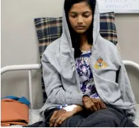  ??  ?? Sonal Tadwi, one of the survivors of the boat accident, rests in a local hospital in Dahanu on Saturday. — AP