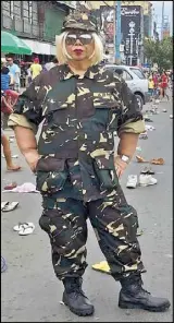  ??  ?? Photo from the Facebook account of the Philippine Army Recruitmen­t Office shows activist Mae Paner, a.k.a. Juana Change, in an Army uniform to protest against martial law during President Duterte’s SONA last Monday. Soldiers and netizens have asked the...