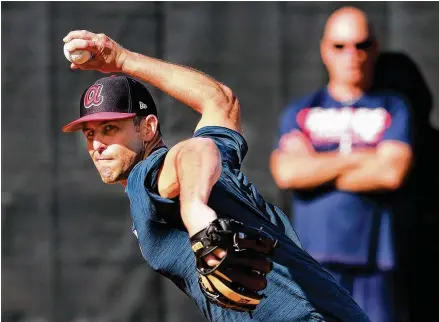  ?? CURTIS COMPTON / CCOMPTON@AJC.COM ?? Braves pitcher Darren O’Day works in the bullpen at the ESPN Wide World of Sports Complex during a recent spring session. A onetime walk-on at Florida who was cut from the baseball team as a freshman, O’Day has recovered nicely.