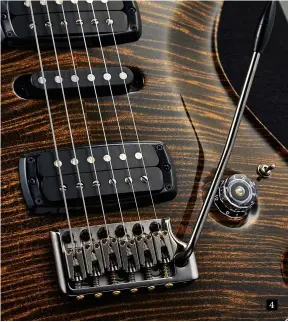  ??  ?? 4. This PRS Gen III vibrato is currently only available on Private Stock models. Each string is locked in the saddle to offer ultimate pitch stability. Slightly narrower than a standard humbucker, this 408-style ‘TCI’ humbucker splits to produce a very true-sounding single coil. In full coil mode it has a measured DCR of 9.50kohms; in true single-coil split mode (which voices the slug coil) it measures 4.79kohms 4