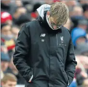  ?? Picture: GETTY IMAGES ?? SHOCK DEFEAT: Liverpool manager Jurgen Klopp looks dejected after their English Premier League defeat against Swansea City at the weekend