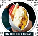  ??  ?? ON THE GO: A famous cone of chips and mayo