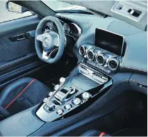  ??  ?? The shifter is easy to operate and the centre cluster has analog gauges.