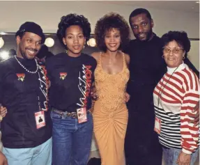  ?? ESTATE OF WHITNEY HOUSTON ?? The documentar­y “Whitney” includes personal photos of the singer with those who were close to her, including, from left, Michael Houston, Robyn Crawford, Gary Houston and Ellen “Aunt Bae” White.