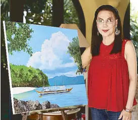  ??  ?? Vicky Zubiri presents her third exhibit which features flowers, birds and seascapes.