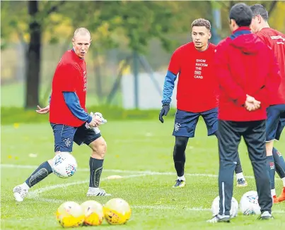  ?? Picture: SNS. ?? Kenny Miller, left, training with the Rangers first team squad on Wednesday. Manager Pedro Caixinha says he could be selected for the trip to face St Johnstone tonight.