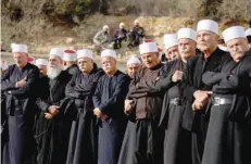  ?? — Reuters ?? Mourners attend the funeral of Tiran Ferro who authoritie­s said was killed in a car crash in the occupied West Bank and briefly held by Palestinia­n gunmen before they handed him over, in the Druze village of Daliyat al-karmel on Thursday.