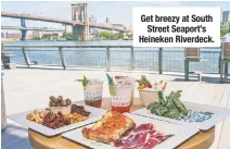  ??  ?? Get breezy at South Street Seaport’s Heineken Riverdeck.