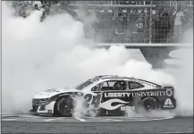  ?? LM OTERO/AP PHOTO ?? William Byron burns his tires after winning the NASCAR Cup race on Sunday at Texas Motor Speedway in Fort Worth, Texas.