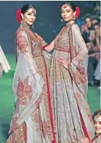  ?? — AP ?? Models walk the ramp during the Bridal Fashion Week organised by the Pakistan Fashion Design Council in Lahore on Friday.