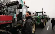  ?? Michel Euler/Associated Press ?? France’s two major farmer unions lift blockades Friday near Paris after “tangible progress” in talks.
