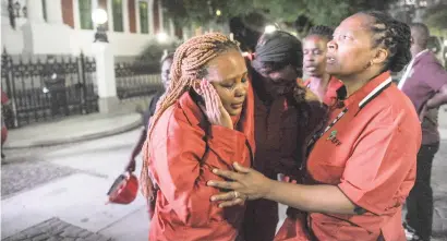  ?? Picture: Alaister Russell ?? TEARFUL. Members of the EFF parliament­ary caucus reacts after being forcefully removed last night in Parliament in Cape Town.