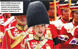  ??  ?? ROYAL GUARDS take part in the Royal Cremation ceremony of Thailand’s late King Bhumibol Adulyadej near the Grand Palace in Bangkok, Thailand, Oct. 26