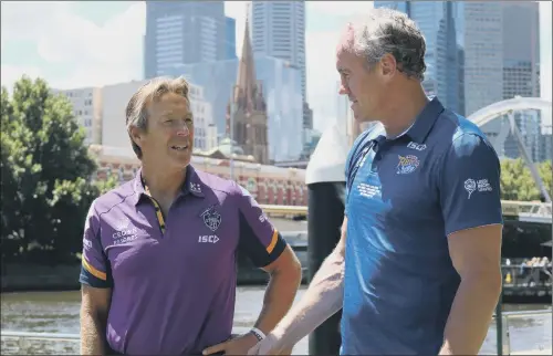  ?? PICTURE: LEEDS RHINOS ?? DOWN UNDER: Coaching rivals Brian McDermott, of Leeds Rhinos, and Craig Bellamy, of Melbourne Storm, discuss Friday’s World Club Challenge in Melbourne.
