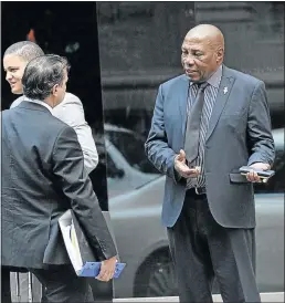  ?? PHOTO: VELI NHLAPO ?? Ex-Bafana coach Shakes Mashaba, right, converses with his legal advisor at the CCMA hearing yesterday.