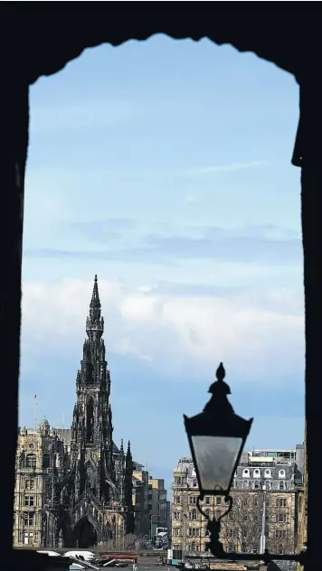  ?? GALLO/GETTY ?? GOING GOTH: A view of the Scott Monument on Princess Street in Edinburgh, Scotland