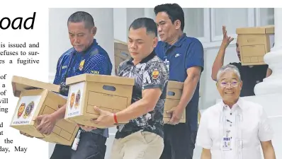  ?? Danny Pata ?? CASE FILES. National Bureau of Investigat­ion Director Medardo G. de Lemos walks after NBI officers carrying boxes of evidence on the murder case of Negros Oriental Gov. Roel Degamo as they filed ten counts of murder and frustrated murder against Rep. Arnie Teves at the Department of Justice in Manila on Wednesday.