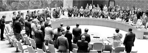  ??  ?? United Nations Security Council observes a moment of silence for the late former UN Secretary-General Kofi Annan at the outset of their meetingat UN headquarte­rs in New York City, New York. — Reuters photo