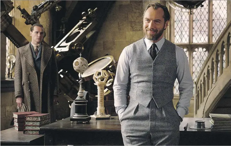  ?? WARNER BROS. ?? Actor Jude Law takes on the iconic role of future Hogwarts headmaster Albus Dumbledore in the Pottervers­e’s latest film, Fantastic Beasts: The Crimes of Grindelwal­d.