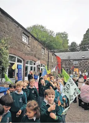  ?? ?? Banner waving Ardvreck pupils at the Climate Action Strathearn event. Pic: Nino Battersby