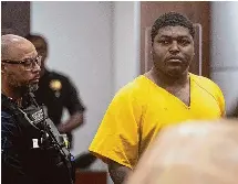 Man charged in deputy’s slaying posts bail, placed on house arrest ...