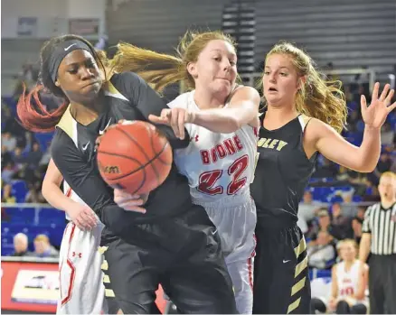  ?? STAFF PHOTO BY TIM BARBER ?? Bradley Central’s Rhyne Howard, left, wrestles the ball away from Daniel Boone’s Jaycie Jenkins (22) with Kaleigh Hughes behind her during their teams’ Class AAA state quarterfin­al Wednesday afternoon. Howard had 12 points, 12 rebounds, five assists...