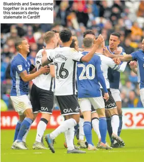  ??  ?? Bluebirds and Swans come together in a melee during this season’s derby stalemate in Cardiff