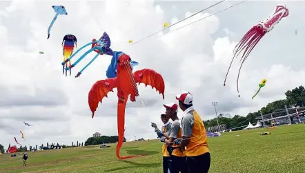  ??  ?? Participan­ts flying kites during the 23rd World Kite Festival in Pasir Gudang, Johor, earlier this month.