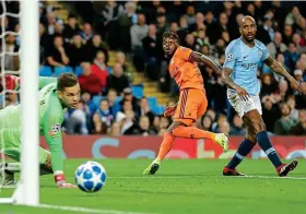  ??  ?? Maxwel’s hammer: Cornet fires the ball past Ederson GETTY IMAGES