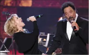  ??  ?? Cerys Matthews and Tom Jones singing their version of ‘Baby it’s cold outside’. How can people seriously think this song has connotatio­ns about spiking someone’s drink?