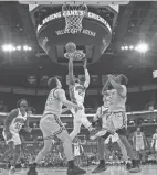  ?? ADAM CAIRNS/COLUMBUS DISPATCH ?? Ohio State guard Malaki Branham (22) hopes that extra time in the gym will help him improve on his averages of 6.3 points, 3.0 rebounds and 1.6 assists per game.