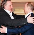  ??  ?? Green card: With Vladimir Putin