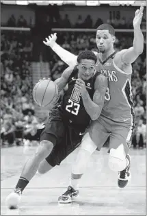  ?? Jonathan Bachman Getty Images ?? THIS MONTH has trended upward for Lou Williams, left, who has averaged 24 points on 49.6% shooting through eight games.