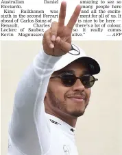  ?? — AFP ?? Mercedes’ Lewis Hamilton celebrates taking pole position for Sunday’s French GP at the Circuit Paul Ricard in Le Castellet on Saturday.