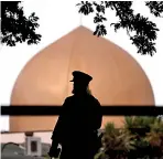  ?? REUTERS ?? A police officer is pictured outside Masjid Al Noor mosque in Christchur­ch, New Zealand, March 17, 2019.