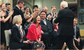  ?? LARS HAGBERG / AFP / GETTY IMAGES ?? Prime Minister Justin Trudeau dissolved the department of Indigenous And Northern Affairs Canada and replaced it with two new ministries, naming Jane Philpott, centre, the minister of the Department of Indigenous Services.