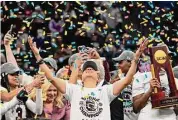  ?? Eric Gay/Associated Press ?? South Carolina head coach Dawn Staley celebrates after her team won the national title last season in Minneapoli­s.