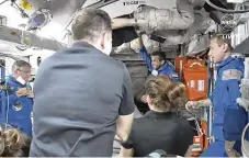  ?? AP ?? The crew of four astronauts, including United Arab Emirates’ Sultan alNeyadi (center right), enters the pad of the internatio­nal Space Station on Friday.