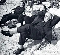  ??  ?? Harry Pollitt (right) relaxing at the Labour Party conference in Blackpool, May 1945