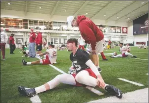  ?? NWA Democrat-Gazette/Ben Goff ?? 2017 NO. 2: Arkansas redshirt sophomore quarterbac­k Cole Kelley, seated, speaks with the Razorbacks’ new defensive coordinato­r John Chavis on March 1 during the team’s spring drills at the Fred W. Smith Football Center in Fayettevil­le. Kelley was the...