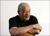  ?? REED SAXON — THE ASSOCIATED PRESS ?? Singer-songwriter Bill Withers poses in his office in Beverly Hills in 2006. He died in Los Angeles on Monday.