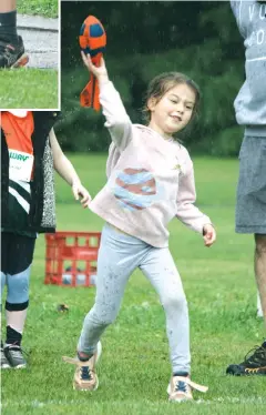  ??  ?? Above: Indi Olsson made an impressive throw of 6.90 metres in her Discus event at Little Athletics.
Right: The Vortex throw is a fun event at Little Athletics. Evie Smythe put her all into this throw on Saturday.