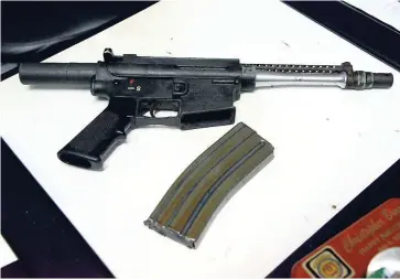  ?? IAN ALLEN/PHOTOGRAPH­ER ?? One of the many illegal guns seized by the police in Rockfort since the start of this year.