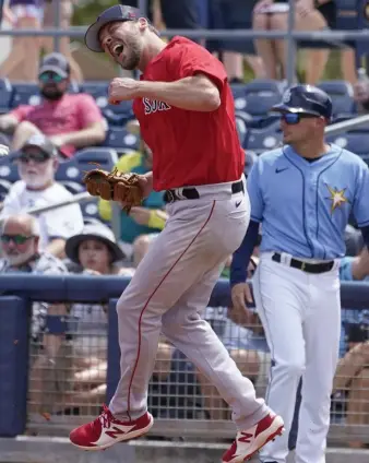  ?? Ap fiLE ?? EVERY FIFTH DAY: Rich Hill reacts to missing the bag on a play at first during a spring training game against the Rays last month.