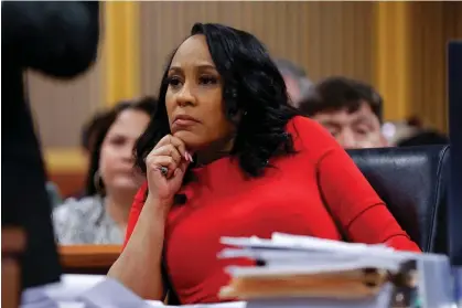  ?? ?? The Fulton county district attorney, Fani Willis, looks on during a hearing in Atlanta on 1 March 2024. Photograph: Getty Images