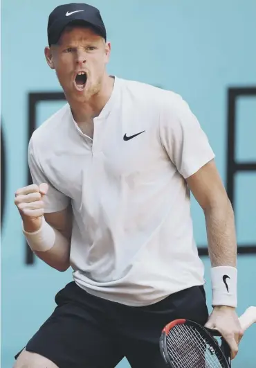  ??  ?? 0 Kyle Edmund reacts after winning a point during his victory over world No 10 David Goffin in Madrid.